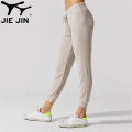 2020 Jiejin Gym Fitness Jogger Pantalones de jogger de color sólido Pantalones de sudor